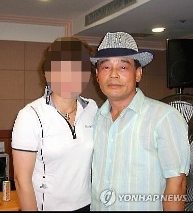 조희팔(오른쪽) <<연합뉴스 자료사진>>