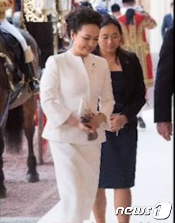 펑리위안 여사와 시밍저. (사진 출처= 대만 자유시보).© 뉴스1