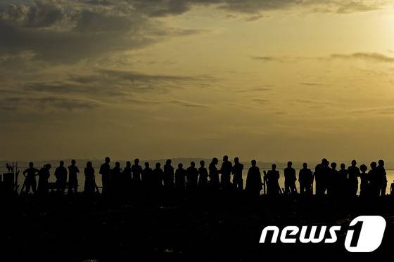 우간다 유권자들이 대선과 총선 투표를 위해 줄을 서고 있다. ©AFP= 뉴스1
