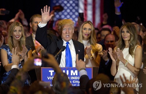Republican presidential candidate Donald Trump is joined by his wife Melania, right, daughter Ivanka, left, as he speaks during a primary night news conference, Tuesday, May 3, 2016, in New York. (AP Photo/Mary Altaffer)