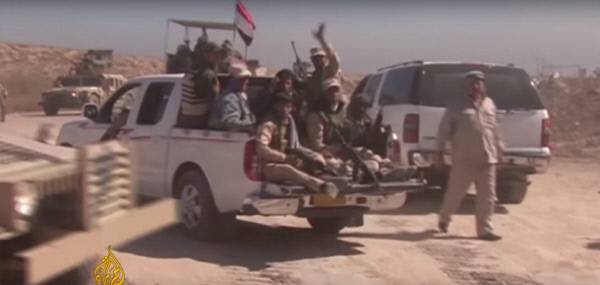 지난 23일(현지시간) 팔루자 수복작전에 나선 이라크 정부군과 시아파 민병대가 작전지역으로 이동하고 있다. ｜알자지라 방송 캡처