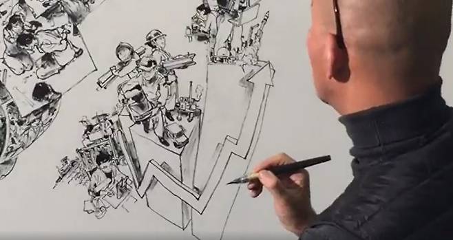 대통령의 메시지로 보는 문재인정부 214일 '나라답게 정의롭게' 기획전시가 열린 10일 오후 청와대 사랑채에서 김정기 작가가 6시간동안 2017년 문재인 정부의 상징적 장면들을 한 편의 그림으로 구현하는 라이브 드로잉 쇼를 펼치고 있다./사진=김정기 작가 페이스북 영상 캡쳐