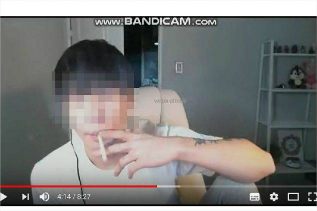 지난 14일 유튜브에 공개된 라임 TV '시우 채널'에서 오 씨가 방송에서 흡연하는 모습. 사진=유튜브 영상 캡처