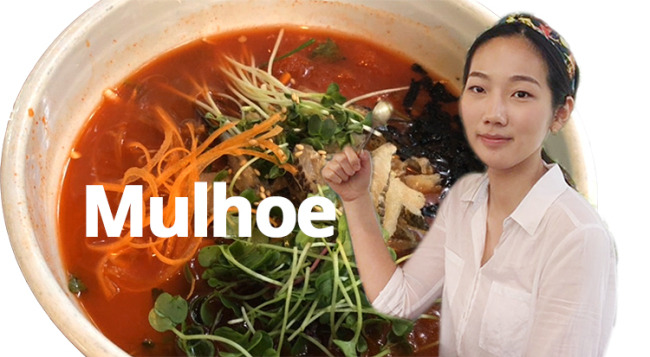 The Korea Herald' Im Eun-byel poses with a bowl of mulhoe (Lim Jeong-yeo/The Korea Herald)