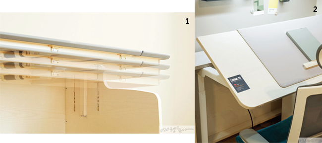 1. 아이의 체형에 맞춰 상판 높이를 조절할 수 있는 이타카네오 모션데스크. 2. 상판 버튼으로 손쉽게 높이를 조절할 수 있다.