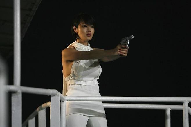 정마담의 "나 이대 나온 여자야"는 '타짜'에서 가장 널리 알려진 대사이기도 하다. (사진=싸이더스 제공)