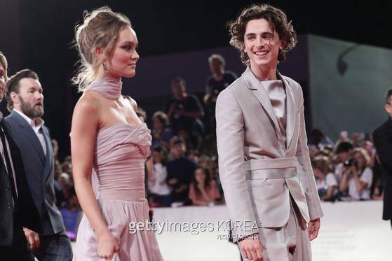 VENICE, ITALY - SEPTEMBER 02: Lily-Rose Depp and Timothee Chalamet attend "The King" red carpet during the 76th Venice Film Festival at Sala Grande on September 02, 2019 in Venice, Italy. (Photo by Vittorio Zunino Celotto/Getty Images)