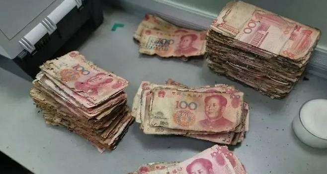 "중국서 '현찰 3억여원' 땅속에 묻어뒀다 훼손…25% 손실" [장쑤신문 캡처. 재판매 및 DB 금지]