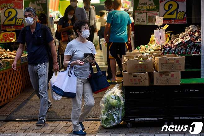 마스크를 착용한 일본 도쿄시민들 <자료사진> © AFP=뉴스1