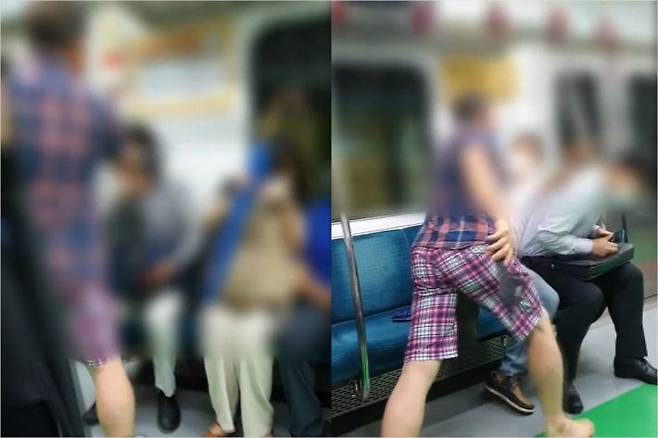 지난 27일 오전 서울 지하철 2호선 열차에서 마스크를 착용하지 않은 50대 남성이 마스크 착용을 요구한 승객들을 향해 폭력을 행사하며 난동을 부리고 있다. 가해자 남성은 피해 승객의 목을 조르기도 하고 자신이 신고 있던 슬리퍼로 얼굴 부위를 폭행하기도 했다. (사진=연합뉴스)