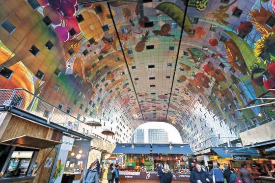 아치형 아파트 안쪽에 전통 시장을 들여놓았다. [사진 각 건축사무소]