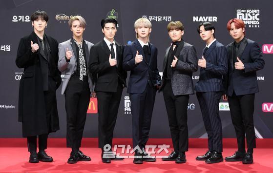 Atez Heres the strength of the suit.Group Atez (Hongjung, Torch, Yoonho, Yeosang, Mountain, Mingi, Wooyoung, Jongho) poses at the red carpet event of the Mnet ASIAN MUSIC AWARDS (Mnet Asian Music Awards) held online on the afternoon of the 6th.2020 MAMA will be broadcast live on Mnet and Olive in Korea, and will be broadcast live around the world through channels and platforms in Asia such as Mnet Japan and TVN Asia, and YouTube Mnet K-POP and KCON official channels.