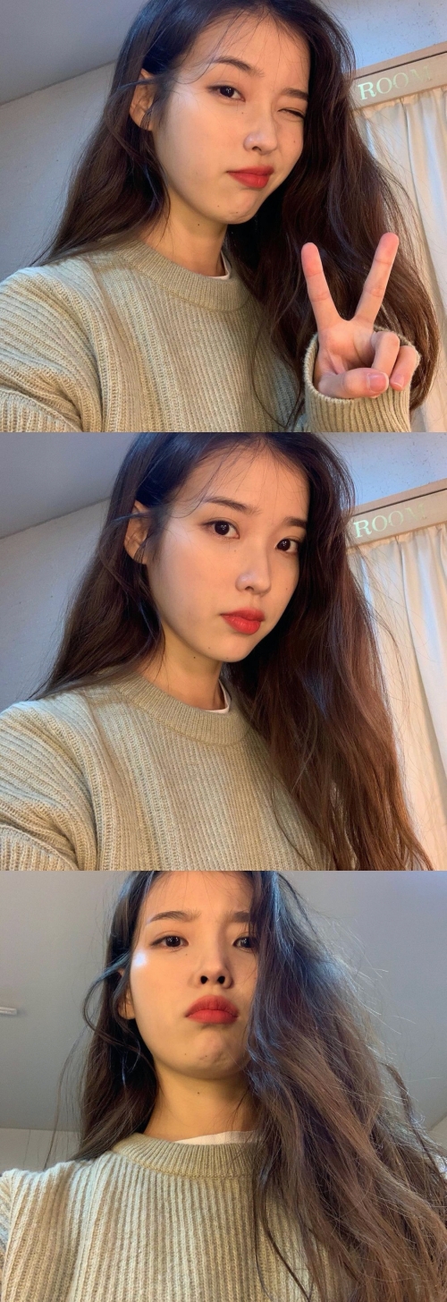 IU, no humiliation even if you take it from below . . . . . . . . . . . . . . . . . . . . . . . . . . . . . . . .Singer IU has released a recent photo.IU posted several photos on her instagram on the 7th with cute emoticons.In the open photo, IU is wearing a beige knit with a warm atmosphere and is taking a self-portrait full of pure beauty.The long wave hairstyle and the makeup that gave the point to the lips were full of feminine charm, attracting attention, and showing a playful picture with a winkling photo.Especially in the photo taken with the camera angle below, IU was surprised to boast of humiliating beautiful looks.On the other hand, IU won three gold medals in 2020 MAMA held on the 6th with Best Female Artist, Best Vocal Performance Solo, and Best CollaborationIU SNS