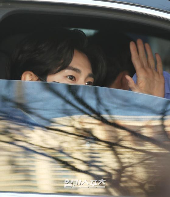 Yunho of group TVXQ is leaving the broadcasting station after finishing Dooshi Escape Cult show which is held on SBS in Mokdong, Seoul on the afternoon of the 19th.