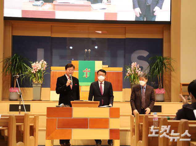 총회에서는 김영걸 대표본부장(가운데)과 박성근 상임부본부장(우)이 각각 추대됐다.
