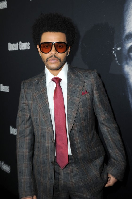 LOS ANGELES, CALIFORNIA - DECEMBER 11: The Weeknd attends the Los Angeles Premiere of ″Uncut Gems″ on December 11, 2019 in Los Angeles, California. (Photo by Joshua Blanchard/Getty Images for A24)