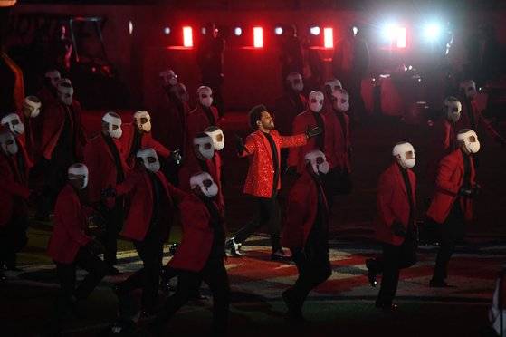 TAMPA, FLORIDA - FEBRUARY 07: The Weeknd performs during the Pepsi Super Bowl LV Halftime Show at Raymond James Stadium on February 07, 2021 in Tampa, Florida. (Photo by Patrick Smith/Getty Images)