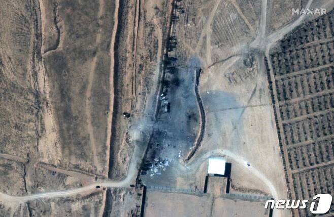 시리아 국경도시 알부 카말 인근 지역의 항공 이미지. 미군의 공습으로 시설들이 파괴돼 있다.  © AFP=뉴스1