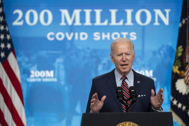 U.S. President Joe Biden speaks in the Eisenhower Executive Office Building in Washington, D.C., U.S., on Wednesday, April 21, 2021. Biden announced that the U.S. will achieve its goal on Thursday of giving 200 million vaccine shots in his first 100 days in office, while pivoting to a new phase of the campaign by urging businesses to make vaccination as accessible as possible. Pool Photo by Sarah Silbiger/UPI