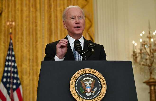 US President Joe Biden delivers remarks on the COVID-19 response and the vaccination program at the White House in Washington on Monday. (AFP-Yonhap)