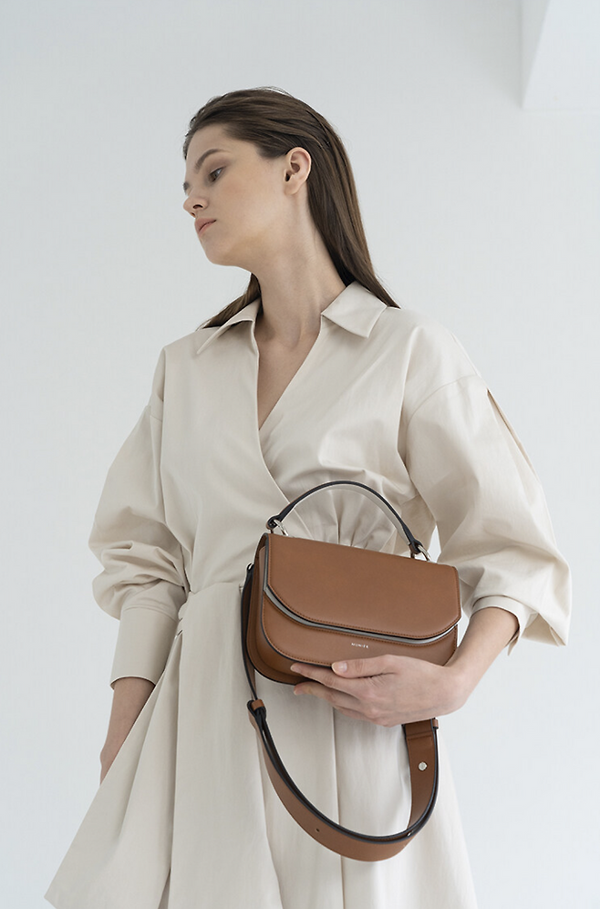 출처: 63 뮤니에 ARCH BAG_BROWN (149,000원)