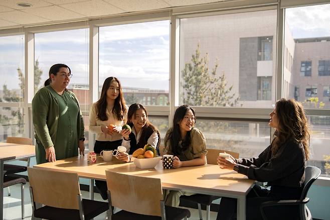 Students and teachers at North London Collegiate School Jeju (NLCS Jeju)