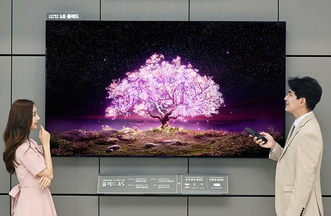 An 83-inch LG OLED TV is displayed at a showroom on Sunday. (LG Electronics)