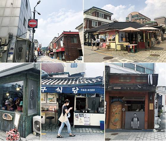 계동 상인들의 모습을 흑백 전신 사진으로 가게 앞에 전시한 계동길 풍경