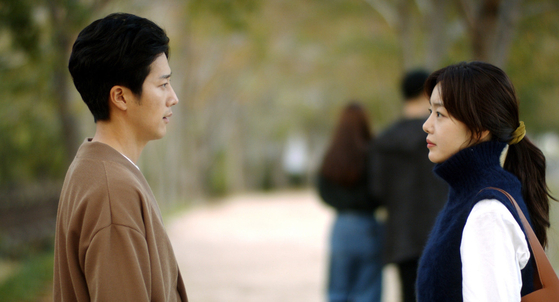An image from the movie "Cinema Street" with actor Han Sun-hwa, right, who plays the lead. [CINESOPA]
