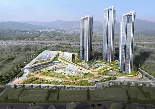 충남 천안시 오룡경기장 부지(위 사진)가 국토교통부가 추진 중인 ‘1호 민관 협력형 도시재생리츠사업’ 대상지로 선정되면서 그 일대가 개발된다. 오룡경기장 부지가 개발되면 조감도(아래)처럼 체육시설과 문화·복지시설, 최고 47층 높이의 아파트가 들어설 예정이다.    천안시 제공