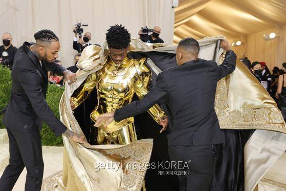 NEW YORK, NEW YORK - SEPTEMBER 13: Lil Nas X attends The 2021 Met Gala Celebrating In America: A Lexicon Of Fashion at Metropolitan Museum of Art on September 13, 2021 in New York City. (Photo by Theo Wargo/Getty Images)