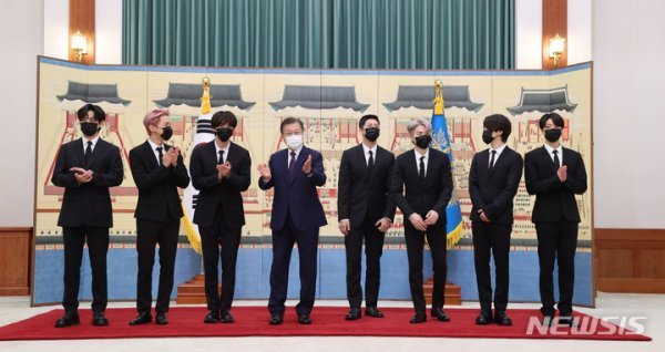 Group BTS reunited with President Moon Jae-in, a year after the first Youth Day celebration event in September last year.BTS attended an event held at Blue House Chungmu Room on the morning of the 14th and received the Presidential SEK Mission (Culture Special Envoy) Appointment from President Moon Jae-in.They exchanged fist greetings with President Moon and received diplomatic passports and fountain pens.BTS will accompany President Moons United Nations General Assembly schedule as an SEK envoy.First, he will give a speech at the 2021 Sustainable Development Goals (SDGs) Moment session on the 20th and show performances on video.As BTS has delivered a message of comfort and hope to the former World, I expect that this BTSs attendance at the United Nations General Assembly will be a meaningful opportunity to expand communication with the former World future generations and to draw future generations sympathy for major international issues, Blue House said.Meanwhile, BTS won three awards at the 2021 MTV VMA in United States of America New York on the 12th (local time), including Best Group, Best K - Pop, and Song of Summer.BTS has also set a record of the most nominations of its own by naming seven nominations at this years awards ceremony.