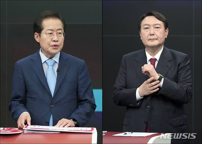 [서울=뉴시스] 국회사진기자단 = 홍준표·윤석열 국민의힘 대선 경선 예비후보가 16일 서울 중구 TV조선에서 열린 방송토론회에서 토론 준비를 하고 있다. 2021.09.16. photo@newsis.com