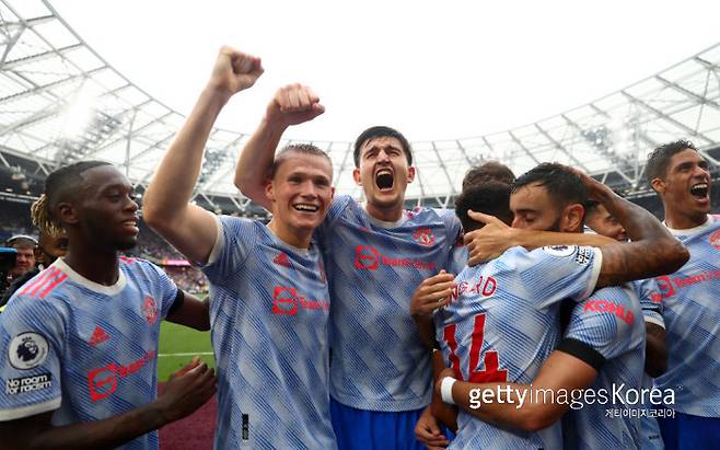 역전에 성공 후 포효하는 맨유 선수들. Getty Images 코리아