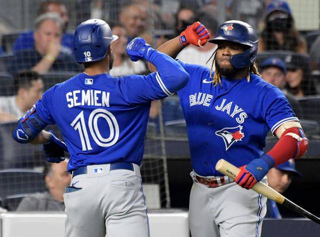 토론토의 타선을 이끌고 있는 게레로 주니어와 세미엔. ⓒ AP=뉴시스