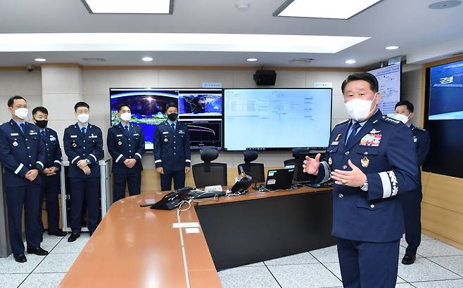 Air Force Chief of Staff Gen. Park In-ho (far right) speaks to officers after attending an opening ceremony for the Air Force Space Center on Thursday. (South Korea's Air Force)