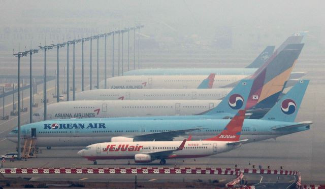 인천국제공항 주기장에 대기 중인 민간항공사 여객기들. 연합뉴스