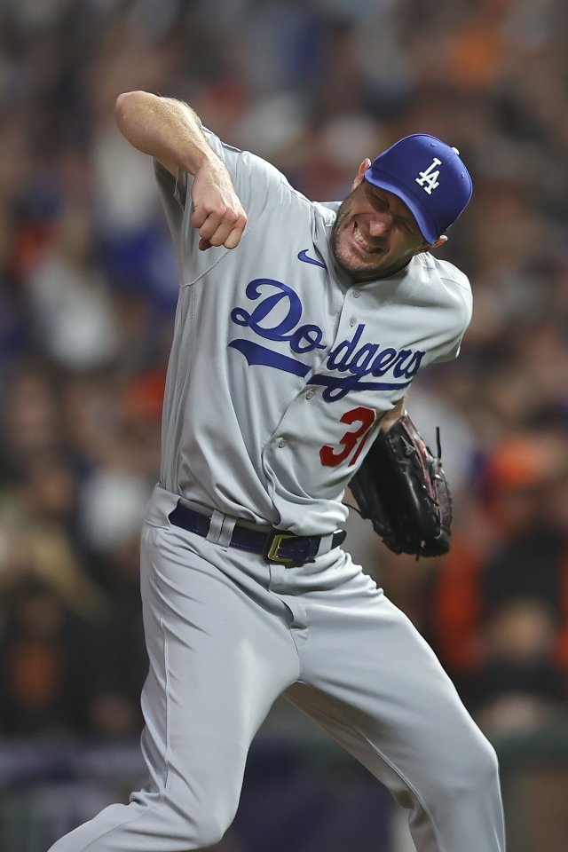 Los Angeles Dodgers pitcher Max Scherzer celebrates after the Dodgers defeated the San Francisco Giants in Game 5 of a baseball National League Division Series Thursday, Oct. 14, 2021, in San Francisco. (AP Photo/John Hefti)