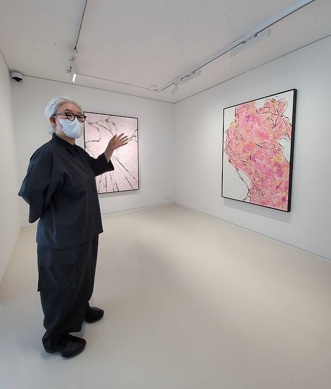 Lee Bul shows her painting series during the press conference of her solo exhibition on Thusrday at BB&M in Seoul (Park Yuna/The Korea Herald)