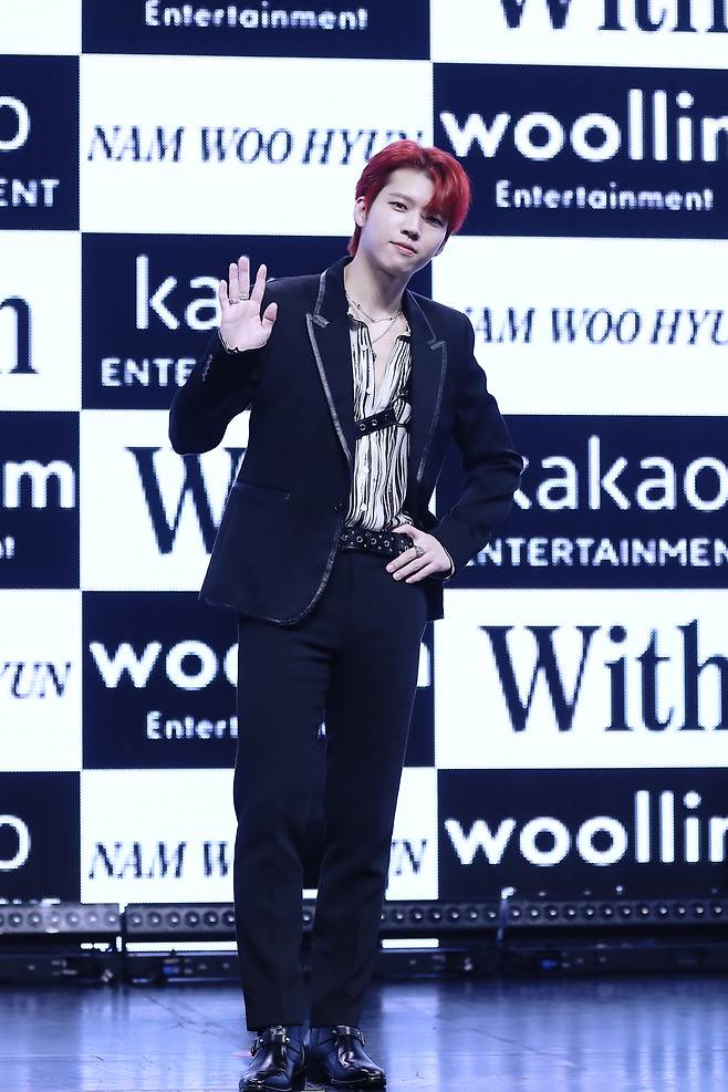 Musician Nam Woo-hyun poses during an online press conference Tuesday. (Woollim Entertainment)