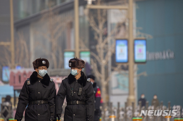 [베이징=AP/뉴시스] 23일(현지시간) 신종 코로나바이러스 감염증(코로나19)이 확산하는 가운데 중국 베이징 거리의 풍경. 2021.01.25.