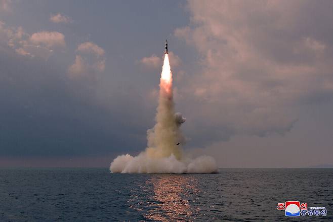 A submarine-launched ballistic missile launched by North Korea flies upward from underwater on Oct. 19. (KCNA/Yonhap News)
