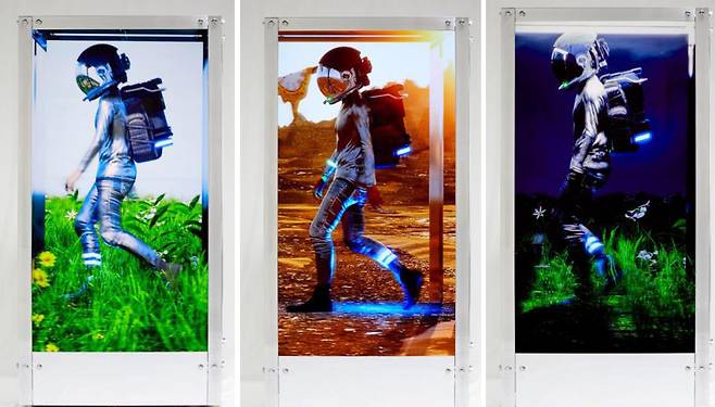 미국 디지털 아트 작가 비플의 NFT 작품 ‘휴먼 원’. 육면체 특수 모니터 안에서 영상이 매분 바뀌며 24시간 넘게 상영된다. 10일 세계 최대 경매 크리스티에서 낙찰가의 두 배 가까운 2890만 달러(약 341억원)에 팔려 NFT 작품에 대한 뜨거운 관심을 증명했다.크리스티 제공