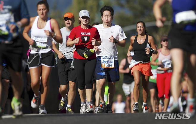 [포틀랜드=AP/뉴시스]2012년 10월7일 미국 오레건주 포틀랜드에서 열린 '포틀랜드 마라톤' 경기