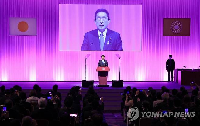 자민당 당대회에서 연설하는 기시다 총리 (도쿄 교도=연합뉴스) 기시다 후미오 일본 총리가 13일 오전 도쿄의 한 호텔에서 열린 제89회 자민당 당대회에서 연설하고 있다. 2022.3.13 [재판매 및 DB 금지] hojun@yna.co.kr