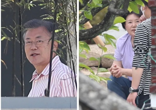 On the morning of May 11, the day after former President Moon Jae-in returned home, he talks with a staff at his residence in Pyeongsan Village in Habuk-myeon, Yangsan-si, Gyeongsangnam-do. The photo on the right shows the former first lady Kim Jung-sook speaking to the staff in her residence. Yonhap News