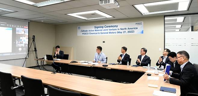 Posco Chemical executives celebrate the launch of Ultium CAM at a virtual signing ceremony with GM representatives. (Posco Chemical)