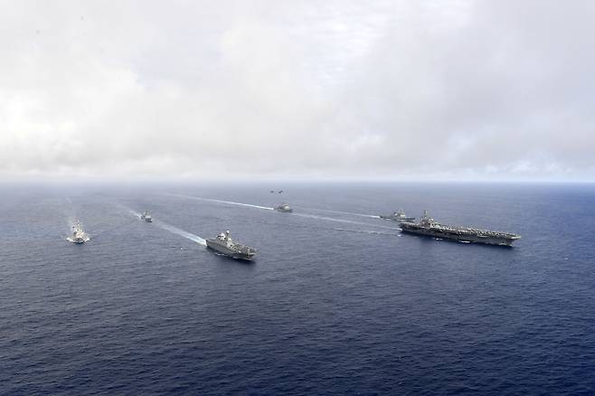 The US Navy‘s nuclear-powered supercarrier USS Ronald Reagan (CVN 76) and its strike group take part in the bilateral military exercises with the South Korean Navy’s fleet between Thursday and Saturday in the international waters southeast of the island prefecture of Okinawa, Japan. (South Korea`s Joint Chiefs of Staff)