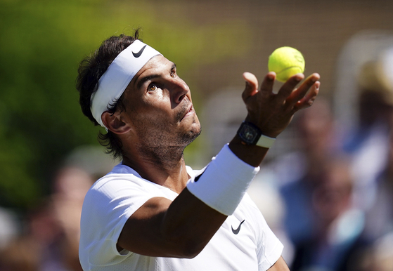 Spain's Rafael Nadal during his ATP EXHO singles tennis match against Stan Wawrinka on day two of the Giorgio Armani Tennis Classic at the Hurlingham Tennis Club in Brighton, England on Wednesday. [AP/YONHAP]