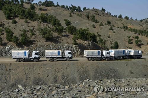 아프간 강진 현장 구호에 나선 세계식량계획(WFP) 소속 차량. [AFP 연합뉴스 자료사진. 재판매 및 DB 금지]